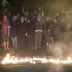 People standing at a firewalk firewalkexperience.co.uk
