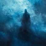 A dark, shadowy figure stands amidst swirling blue and black mist, creating an ethereal, mysterious scene.
