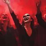 A crowd of people, painted in a dramatic red and black palette, is depicted in a state of ecstatic celebration, with one prominently smiling and raising her hand.